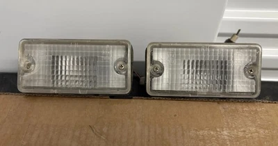 Luces de lámpara de parachoques trasero izquierda derecha Nissan Datsun 720 1980-85 camioneta OEM ~ Japón  Foto 1 de 4
