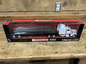 New-Ray 15363A 1:43 Kenworth W900 Long Hauler with Flatbed Trailer - Picture 1 of 9