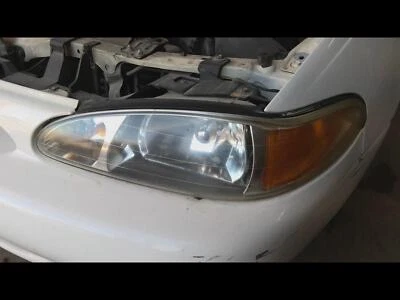 Conjunto de faros izquierdos usados se adapta a: Ford Escort 1998 exc. Cpe Izquierdo Grado A Foto 1 de 4