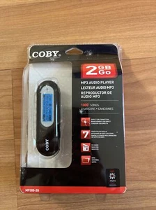 NEW SEALED Coby MP3052G 2GB USB-Stick MP3 Player with LCD Screen w/ FM Radio - Picture 1 of 6
