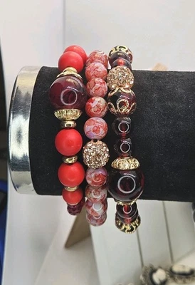 Impresionante dramático juego de 3 pulseras de color rojo Foto 1 de 4