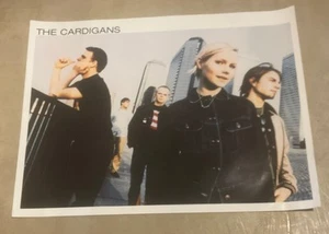 THE CARDIGANS "FIRST BAND ON THE MOON" PÓSTER PROMOCIONAL 2 CARAS - ESQUINA PUNTO MOJADO - Imagen 1 de 5
