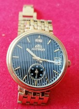 astron uhren gold