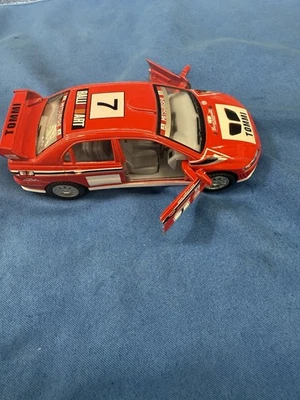 Kinsmart Mitsubishi Lancer Evo #7 Tommi Makinen Red Rally 1/36 Foto 1 de 3