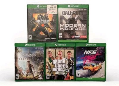 Xbox One Games Lot GTA V, Call Of Duty, Assassin's Creed, Need for Speed - Image 1 of 2