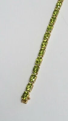  VINTAGE SOLID 10 K GOLD NATURAL PERIDOT AND DIAMONDS BRACELET  , 7.5 " LONG - Image 1 of 4