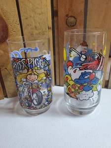 2 Vintage 1980s Cartoon Collector Glasses Hardee's Smurf/ McDonald's Miss Piggy - Picture 1 of 3