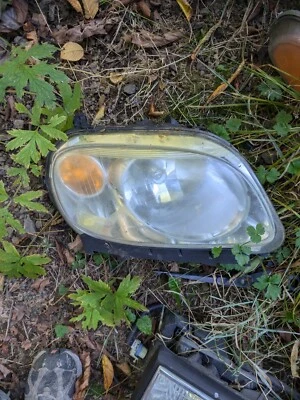 Faro halógeno pasajero derecho Chevrolet HHR 2006-2011 OEM 15827442 Foto 1 de 4