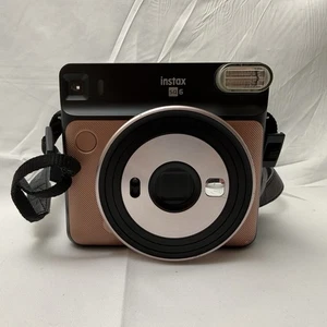 Fujifilm Instax SQ6 Sofortbildkamera Blush Gold mit Tasche inklusive - Bild 1 von 6