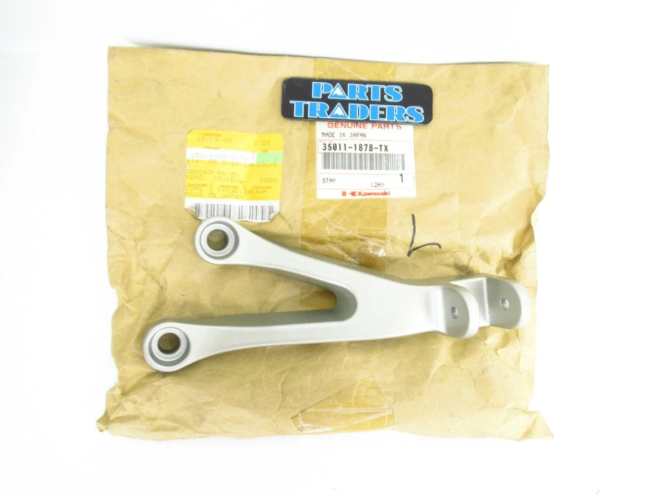 Clavija de pie de pasajero trasera izquierda Kawasaki plateada Ninja ZX-6R/ZX-9R genuina nueva de stock  Foto 1 de 1