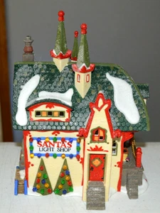 Dept 56 North Pole Series - Santa's Light Shop #56397 - Picture 1 of 6