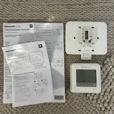 Honeywell T4 Pro Programmable Thermostat - TH4110U2005 - Image 1 of 4