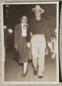 Vintage Photo Happy Couple Walking Jan 1952 Cowboy Hat Black & White 3.5" x 2.5" - Picture 1 of 2