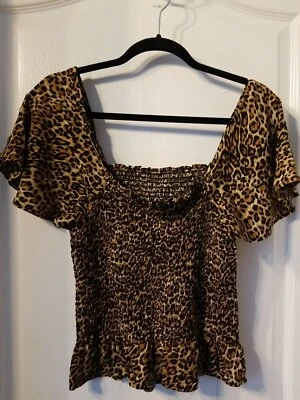 Top ajustado estampado de leopardo Jessica Simpson talla mediana nuevo sin etiquetas Foto 1 de 4