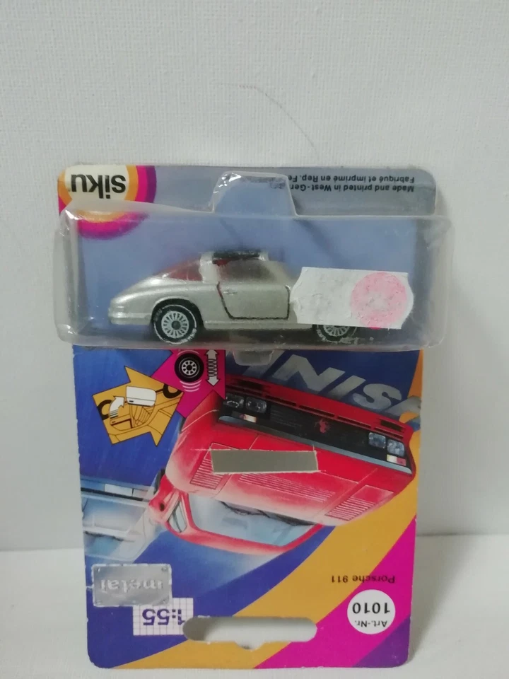 SIKU 1010 PORSCHE 911 ARGENTO METALLIZZATO CAPOVOLTO ERRORE DI FABBRICA RARO - Immagine 1 di 4