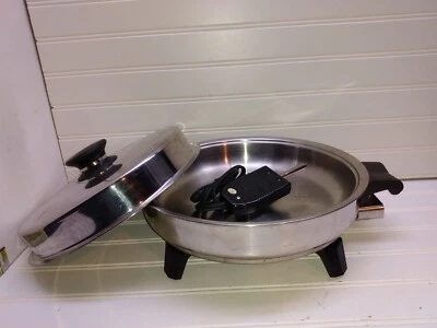 Sartén Eléctrica Rena Ware 11" Acero Inoxidable West Bend Núcleo Líquido Salteado Sartén Tapa Foto 1 de 4