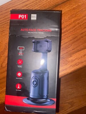 Auto Face Tracking Tripod with Remote 360° Rotation Tracking Phone Holder Stand - Image 1 of 2