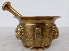 VINTAGE IN BRASS APOTHECARY MORTAR & PESTLE ADORNATED WITH THREE LION HEADS