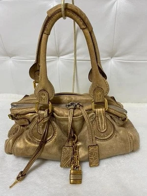 Bolso de Mano Chloe Paddington Champagne Dorado Bolso de Mano Diseño de Cadena Usado Foto 1 de 4