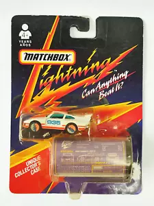 1991 MATCHBOX DIECAST - LIGHTNING PORSCHE 935 + COLLECTORS CASE - FACTORY SEALED - Picture 1 of 9