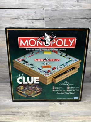 Deluxe Wood Cabinet Monopoly + Clue + Cribbage + Chess + Checkers + Dominoes - Image 1 of 4