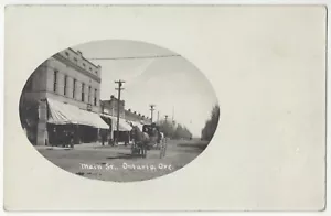 1907 Ontario, Oregon - REAL PHOTO Main Street - Vintage Postcard - Imagen 1 de 2