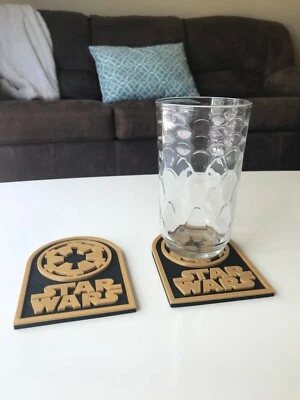 Juego de 2 posavasos dorados y negros inspirados en Star Wars Foto 1 de 3
