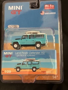 Mimi GT land rover defender 110 light blue with surfboard - Picture 1 of 2
