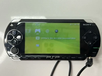 Consola portátil Sony PSP 1001 sistema negro CON CARGADOR - sin batería Foto 1 de 4