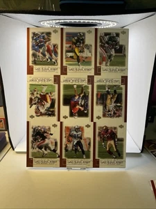 Hoja de tarjetas de fútbol americano UD Top Tier 2001 sin cortar Warner/Hasselbeck/Davis y otros - Imagen 1 de 3