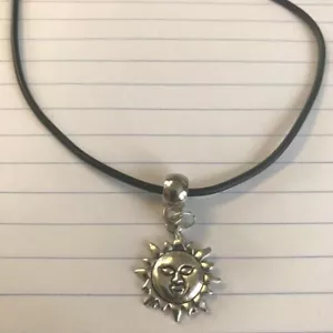 sun tibetan silver charm pendant on a 18" black leather necklace - Picture 1 of 2