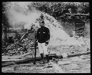 WW1 BELGIAN SOLDER AT HALEN NEAR RUINED COTTAGES Magic Lantern Slide PHOTO - Picture 1 of 3