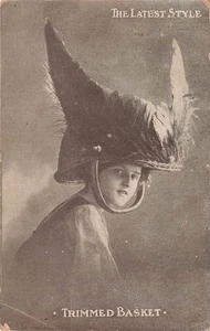 PRETTY LADY IN GARISH TRIMMED BASKET HAT THE LATEST STYLE POSTCARD 1910 110225 U - Picture 1 of 2