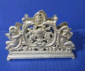 Servilletero con letras putti-querubines superposición plateada escultura - Imagen 1 de 9