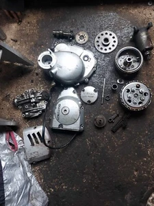 SUZUKI GN125 GN 125 JOB LOT OF ENGINE PARTS WITH CLUTCH STATOR COVERS - Picture 1 of 5