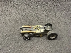 Chasis especial Aurora AFX 4 engranajes Ho Slot Car funciona muy bien Magna-Traction #16 - Imagen 1 de 5