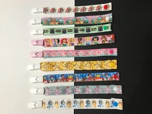 Character Dummy Chain / Double sided ribbon / Aristocats/ Bluey / Toy Story ect. - Picture 1 of 2