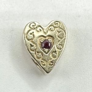 Charm scivolo Joshua oro giallo 14 kt granato a forma di cuore .9g - Foto 1 di 9