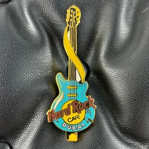 DUBAI UAE🎸Hard Rock CAFE®HRC PIN✅1997 Blue Guitar Yellow Strap BROWN LETTERS🎗 - Picture 1 of 3