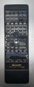 Mando a distancia original para VCR/TV G0410GE Sharp VC607 V6608 VCA607 VCH857 - Imagen 1 de 3