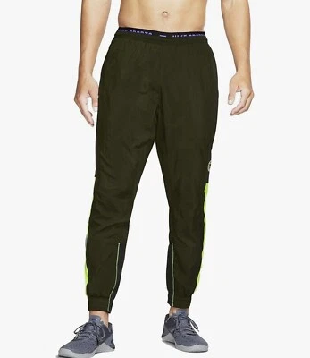 Calça de treino Nike Sweats masculina M Dri-Fit BV3268-355 flexível verde/roxo - Imagem 1 de 4