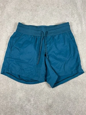 Pantalones cortos para mujer The North Face Afrodita azul verdoso pequeños largos Foto 1 de 4