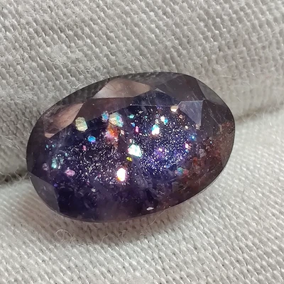 Piedra preciosa natural Galaxy Flash iolita corte piedra solar forma ovalada para joyería 2,6 quilates Foto 1 de 4