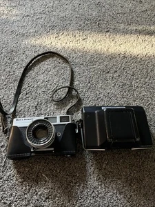 Macchina fotografica vintage Canon Bell & Howell Canonet 19 pellicola 45 mm F/1.9 custodia in pelle - Foto 1 di 9