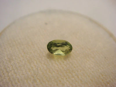 Peridot Oval Cut Gemstone 5 mm x 3 mm 0.20 Carat Natural Green faceted Gem - Image 1 of 3