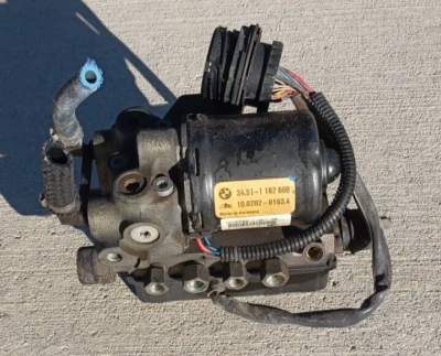 Unidad de módulo de bomba de freno antibloqueo ABS BMW E36 M3 96-99 OEM Foto 1 de 4