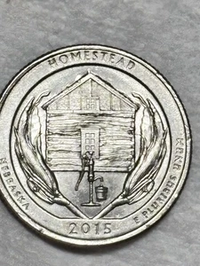 2015 Nebraska State Quarter With A Leaky Bucket And Snow On The Roof Very Rare. - Picture 1 of 9