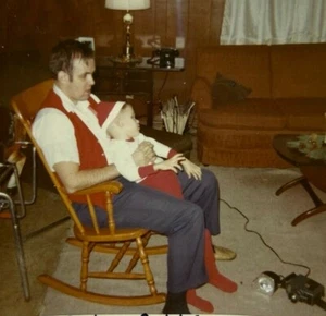Father Holding Son In Rocking Chair Christmas Hat Color Photograph 3.5 x 3.5 - Picture 1 of 3
