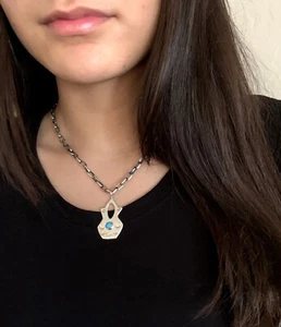 Colgante Navajo hecho a mano en forma de florero turquesa y plata de ley - Imagen 1 de 8