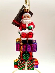 Christopher Radko - Gifted Fellow #1016140 Santa Sitting On Stack Of Presents - Picture 1 of 5